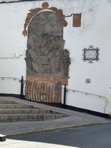 Historische Szene im Wandrelief mit Schiff Wandrelief 1ª vuelta al mundo